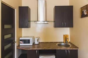 Отель Villa Zhanna. Делюкс двухместный с кроватью размера «king-size» 11